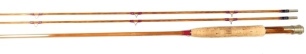 A Thomas & Thomas "Montana" 2 piece (2 tips) cane trout fly rod, '6", #6, red silk wraps, walnut reel seat and nickel silver screw grip reel fitting, stamped makers details, western style grip, swollen butt section, Carbide butt rig, hayfork tip rings an