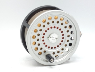 A Hardy Marquis Disc 9/10/11 salmon fly reel, composition handle, alloy foot, two screw spring drum latch and rear tension regulator, little used condition and in zip case and a Hardy "Deluxe Classic" 3 piece carbon salmon fly rod, 13'9", #9, crimson/sca