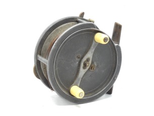 A Hardy Silex 4 ¼" bait casting reel, caged drum with twin ivorine handles on alloy crossbar arm, spring release latch, brass bridge foot, cut-away rim section, three rim mounted casting controls, wear from normal use, circa 1900