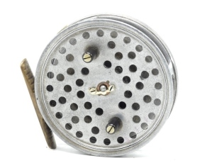 A scarce Hardy Davy 3 ½" trout fly reel, contracted narrow drum with twin ebonite handles, multi-perforated front plate and nickel silver telephone drum latch, ribbed brass foot, milled rim tension screw and Mk.II check mechanism, wear from normal use, c