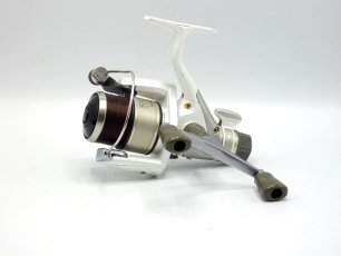 A Shimano Stradic 3000 GTM bait runner reel, twin handles, rear tension adjuster, with spare spool, boxed and a Shimano "Nessa Limited S1010M+" 3 piece carbon lure rod, 10'10", 8-42g, black/gold tipped wraps, screw grip reel fitting, little used conditio