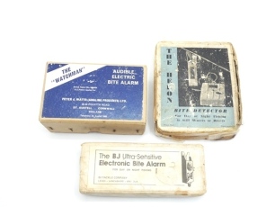 A BJ Ultra-Sensitive electronic bite indicator, in original card box and with instruction leaflet and a Peter J. Watts "The Watchman" audible electric bite alarm, in original card box and perspex case, with instructions (2)