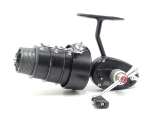 A rare Mitchell 300 tournament casting reel, 1969 model with tapered quadruple section tournament spool, extended manual triple pick-up line guide, folding, screw locking handle above a milled alloy tension regulating adjuster, rear anti-reverse bar lever