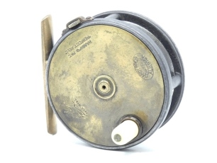 A good Hardy Brass Faced Perfect 3 1/8" trout fly reel, domed ivorine handle, brass foot, strapped rim tension screw with early calliper spring check mechanism, contracted drum with four rim cusps and milled nickel silver locking screw, faceplate stamped