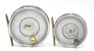 A Hardy Uniqua 3 5/8" trout fly reel, ivorine handle, brass foot, nickel silver horseshoe drum latch, fixed Mk.I check mechanism and a Hardy Uniqua 2 ?" trout fly reel, ebonite handle, ribbed brass foot, nickel silver telephone drum latch, fixed Mk.II che