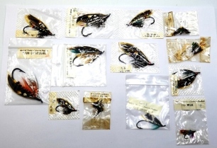 Eighteen Hardy eyed salmon and sea-trout flies contained in original cellophane packets with printed pattern tabs in each packet, various patterns and sizes including Dusty Miller, Thunder & Lightning, Black Doctor, Alexandra et al (18)