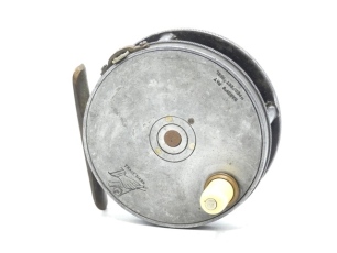 A scarce early Hardy Perfect 3 1/8" trout fly reel, domed ivorine handle on milled brass cup, pierced brass foot, strapped rim tension screw and early calliper spring check mechanism, contracted drum with four rim cusps and milled nickel silver locking s