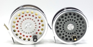 A Hardy Marquis No.2 salmon fly reel, re-issue model with composition handle, alloy foot, two screw drum latch, rear tension regulator as new condition, in neoprene pouch and a similar re-issue Marquis Salmon No.1 fly reel, also in new/unused condition, i