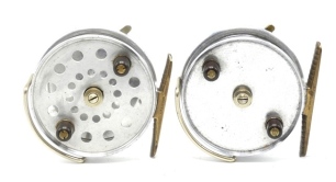 A Hardy Longstone 3 ½" sea centre pin reel, drum with double band of perforations, twin reverse tapered ebonite handles and milled brass spindle tension nut with milled nickel silver locking screw, Bickerdyke line guide, brass foot, rim mounted optional c