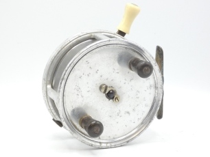 A Hardy Sea Silex 5" sea centre pin reel, solid drum with twin reverse tapered ebonite handles and nickel silver telephone latch, brass foot, rim mounted ivorine casting trigger, optional check lever and milled tension screw, wear/light corrosion marks 