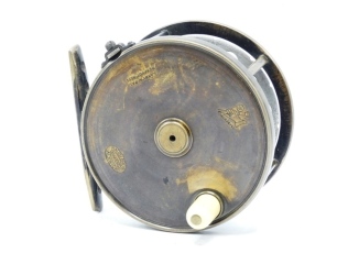 A rare Hardy Transitional Brass Perfect 4 ¼" alloy drummed salmon fly reel, domed ivorine handle, bridge foot pierced nine holes, strapped rim tension screw with Turk's head locking nut and early calliper spring check mechanism, open ball race with steel 