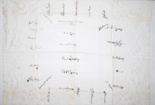 ‘Australian & England Test Series 1926’. A tablecloth with intricate decorative lacework borders, signed in black ink by twenty eight England and Australia Test players. Handwritten title to centre with the signatures of the England captain, Arthur Carr, 