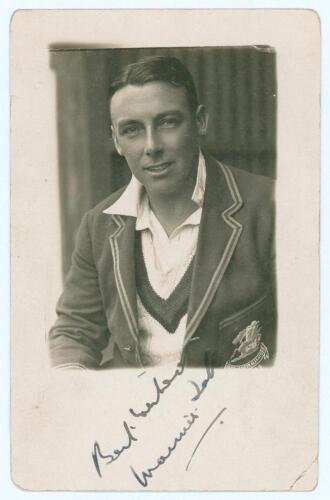 Maurice William Tate. Sussex & England 1912-1937. Original sepia real photograph postcard of Tate depicted head and shoulders in cameo wearing M.C.C. touring blazer for the 1928/29 tour to Australia. Nicely signed in black ink to the lower margin by Tate.