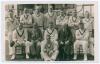 Derbyshire C.C.C. c.1930s. Mono real photograph plain back postcard of the Derbyshire players and officials seated and standing in rows wearing cricket attire, probably late 1930s. Official stamp to verso for Albert Wilkes & Son, West Bromwich. Players in