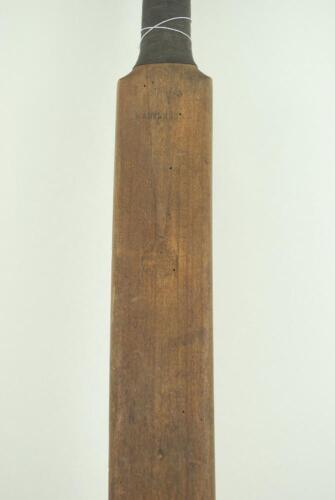 ‘A Warsop Triangular Bat circa 1890’. A triangular practice cricket bat made by Benjamin Warsop of St. John’s Wood, London. The triangular shaped bat’s blade is only 2.5” in width and has ‘B. Warsop, Marylebone’ stamped across the splice and below a faded