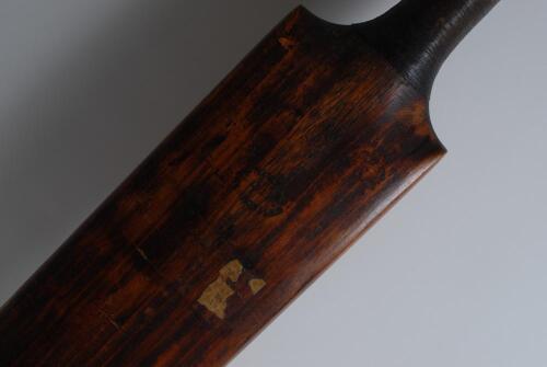 G.O. Smith’s Crawford Exceller’ bat c.1896 by H.C. Crawford of Plumstead, Kent. Impressed to the shoulders of the face ‘J. Wisden & Co. London’ and below the splice ‘Crawford Patent Exceller’. Also inscribed in ink to the front shoulder ‘G.O. Smith’. Belo