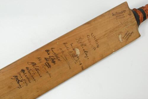 South African tour of England 1935. John Wisden &lsquo;Union Driver&rsquo; cricket bat signed to face by eleven of the South African tourists. Signatures include Wade (Cpt), Cameron, Mitchell, Nourse, Bell, Williams, Balaskas, Tomlinson etc. Some slight spidering to 