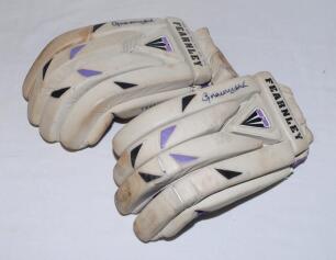 Graeme Hick, Worcestershire & England. Pair of Duncan Fearnley batting gloves worn by Hick in his playing career. Each glove signed in black ink by Hick. Previously sold by Knight’s at the Graeme Hick Benefit Year auction held in September 1999. Minor wea