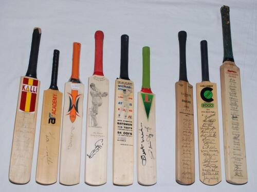 Miniature cricket bats. Nine miniature bats including one multisigned, five individually, and three with facsimile signatures. Signed bats are ‘Kalli’ signed by ten England players v West Indies 1995 including Atherton Knight, Emburey, Thorpe, Cork, Frase