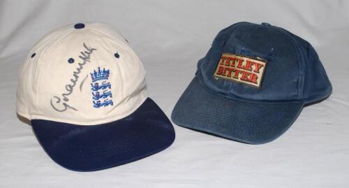 Graeme Hick, Worcestershire & England. Two England one day International baseball style training caps worn and signed by Hick. One in cream with navy blue peak, embroidered three lions and crown emblem of England to front, signed to the front. The other i