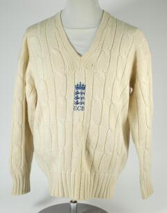 Kenneth Shuttleworth. Lancashire, Leicestershire & England 1964-1980. E.C.B. long sleeved sweater and blazer worn by Shuttleworth whilst officiating as an umpire in first class matches. The sweater, by BSB, with central E.C.B. emblem of the three lions an