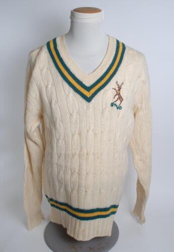 Nottinghamshire white 1st XI long sleeved sweater, by Eyreknit, with trimming to collar and waist in club colours, Nottinghamshire emblem of a stag to chest. Size 46”. This appears to be a 1960’s sweater. Player unknown. Good condition