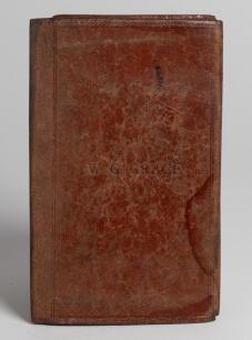 William Gilbert Grace. Gloucestershire & England. 1865-1908. A limp calf brown leather wallet which once belonged to Grace with his name ‘W.G. Grace’ stamped into the surface of the wallet. It was apparently acquired by a gardener to a relative of Grace a