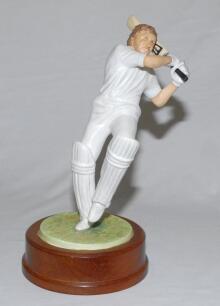 Ian Terence Botham. Somerset, Worcestershire, Queensland, Durham and England 1974-1993. ‘Arlott’s Immortals’. Excellent porcelain hand decorated action figure of Botham in batting pose in mahogany plinth, sculptured and produced in Alderney in 1982 by Cou