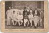 Australian tour to England 1888. Rare original sepia cabinet card of the Australian touring party, standing and seated in rows in cricket attire, the majority wearing caps. The photograph by London Stereoscopic Co. Printed title to left hand border ‘The A