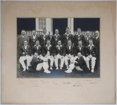 The 17th Australians. Australia tour of England 1930. Exceptionally large and impressive official mono photograph of the full Australian touring party, seated and standing in rows in cricket attire and blazers. Nicely signed in ink to lower border by all 