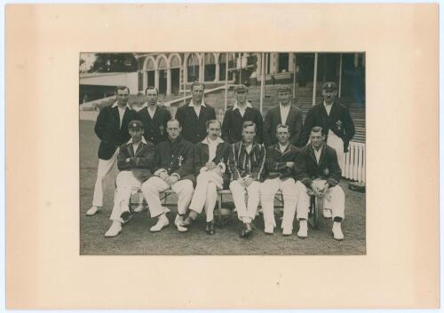 Surrey C.C.C. 1921. Original mono press photograph of the Surrey team, seated and standing in rows in front of the pavilion at The Oval, wearing cricket attire and blazers. Players featured are Fender (Captain), Hobbs, Reay, Howell, Strudwick, Hitch, Peac