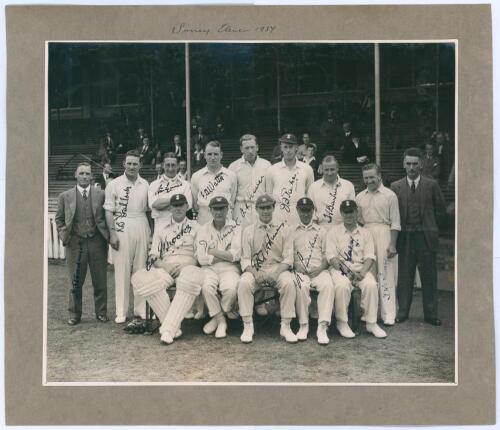 ‘Surrey Eleven 1937’. Large original mono photograph of the Surrey team seated and standing in rows wearing cricket attire, some in caps. In the background is the pavilion with a sprinkling of spectators. Very nicely signed in black ink by all twelve Surr