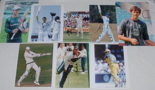 Australia Test cricketers. Eight colour press photographs of Australian Test players, each signed to the image by the featured player. Signatures are Shane Warne, Darren Lehmann, Jason Gillespie, Justin Langer, Alex Doolan, Tom Moody, Ashton Agar and Josh