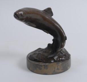 Leaping Salmon. An attractive leaping salmon in bronze mounted on circular marble plinth, signed ‘Andre’ to back. Approximately 8” tall. Good condition