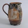 Royal Doulton Lambeth Golf Pitcher jug. A large and impressive Royal Doulton Lambeth stoneware jug, of bulbous form, with art nouveau design with scrolled foliate borders, enriched in green, blue and brown glazes, with three golfing scenes in white relief - 2
