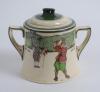 Royal Doulton &lsquo;Golfing series&rsquo; two handled sugar basin with lid, the body decorated with a continuous scene of cavalier figures (Crombie) of golfers and caddie playing golf with proverb inscription &lsquo;Promise little and do much&rsquo;, decorated with green line d - 2