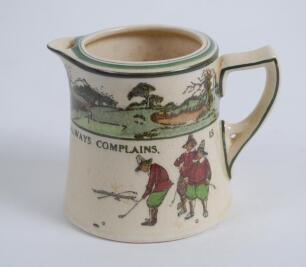 Royal Doulton ‘Golfing series’ milk jug, the body decorated with a continuous scene of cavalier figures (Crombie) of golfers and caddies playing golf with proverb inscription ‘He that complains is never pitied’, decorated with green line decoration to ext