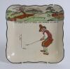 Royal Doulton ‘Golfing series’. A square bowl with scalloped edge, decorated in colour with cavalier figures (Charles Crombie) playing golf with proverb inscription ‘Give losers leave to speak and winners to laugh’. Colour golf course border to top border