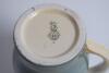 Royal Doulton Queensware blue mug/tankard with a golf scene of cavalier golfer with caddie (Charles Crombie) to one side and a smaller group playing golf to verso. Royal Doulton mark to the bottom of the mug. 5.5” tall. Circa 1930. Very good condition - 3