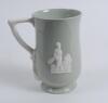 Copeland Spode ‘Fortuna’ golf jug in light blue with golf scene in white to sides and caddie to verso. Copeland Spode mark to base. 7” tall. circa 1950?. Very good condition - 2