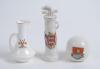 Golf. Three crested china golf ceramics. A golf ball with colour crest for Western Super Mare, a golf bag with clubs with crest for Hunstanton Village (Arcadian) and a small vase with scene of golfer and caddie to side (Folly China). Various sizes. Good c