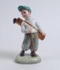 An earthenware figure of a boy golfer, circa 1937. Made by Stefan Dakon,Austria, 1904-1992 for Keramos. 9” tall. Printed factory marks and ‘Dakon’, impressed numbers ‘2121/32/L’ to base. Very good condition