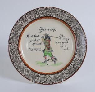 ‘Proverbs’. Royal Doulton Series ware plate transfer printed with a panel of a golfer, inscribed Proverbs, If at first you don’t succeed try again. A miss is as good as a mile, the base stamped Royal Doulton, 10” diameter. Good condition