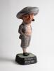 ‘He Played a Penfold’. Large advertising Penfold golf Figure. A colourful advertising golf figure with an oversized cap on base with the painted slogan. 20.5” tall. There are some marks to the paint work, wear to the back of the cap and damage to pipe and