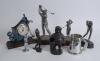 Golf figures. Selection of six metal or composite figures of golfers, four are of golfers driving, one in silver metal by Lejeune and possibly a car mascot, 5.5”, one of Harry Vardon etc, one of putting and a large barrel shaped golfer, with pen holder? t