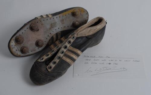 Leslie Joseph Smith. Wolverhampton Wanderers (1947-56) and Aston Villa (1956-60). A pair of Adidas ‘Weltmeister’ football boots worn by Smith on whilst playing for Aston Villa between 1956 and 1960. The black boots with three white stripes have no laces 