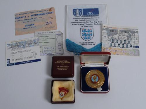 Aston Villa. Commemorative coin/medal. ‘Aston Villa. European Winners 1982’. Commemorative gilt medal with details in claret and blue to centre. Sold with two Aston Villa ‘European Champions 1982’ 20th Anniversary pin badges. All three mounted in display 