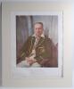 ‘Sir Donald Bradman’. Large colour print of a portrait of Bradman, seated three quarter length wearing Australia Test blazer. Printed title to lower border with description, ‘The original was presented to the South Australian Cricket Association by the Tr