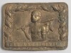 ‘The Aboriginals’. Victorian brass metal embossed belt buckle, depicting an Aboriginal cricketer with a bat over his shoulder to which his cricket boots are hanging. A cricket tent with flag flying to background with floral decorative border and to lower 