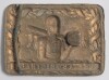 ‘The Aboriginals’. Victorian brass metal embossed belt buckle, depicting an Aboriginal cricketer with a bat over his shoulder to which his cricket boots are hanging. A cricket tent with flag flying to background with floral decorative border and to lower - 2